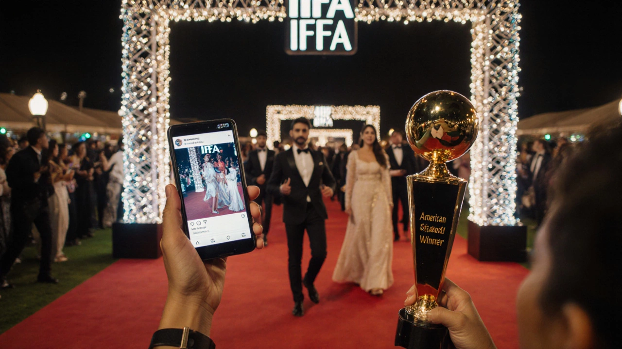 Bollywood stars on IIFA red carpet in Dubai with fan holding phone